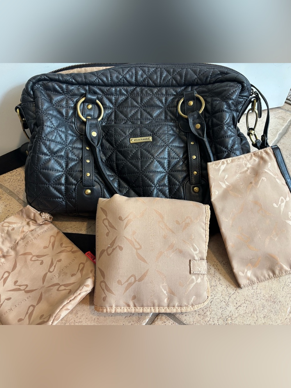 Storksak Elizabeth Black Quilted Leather Diaper Bag Beige Accessories Mat